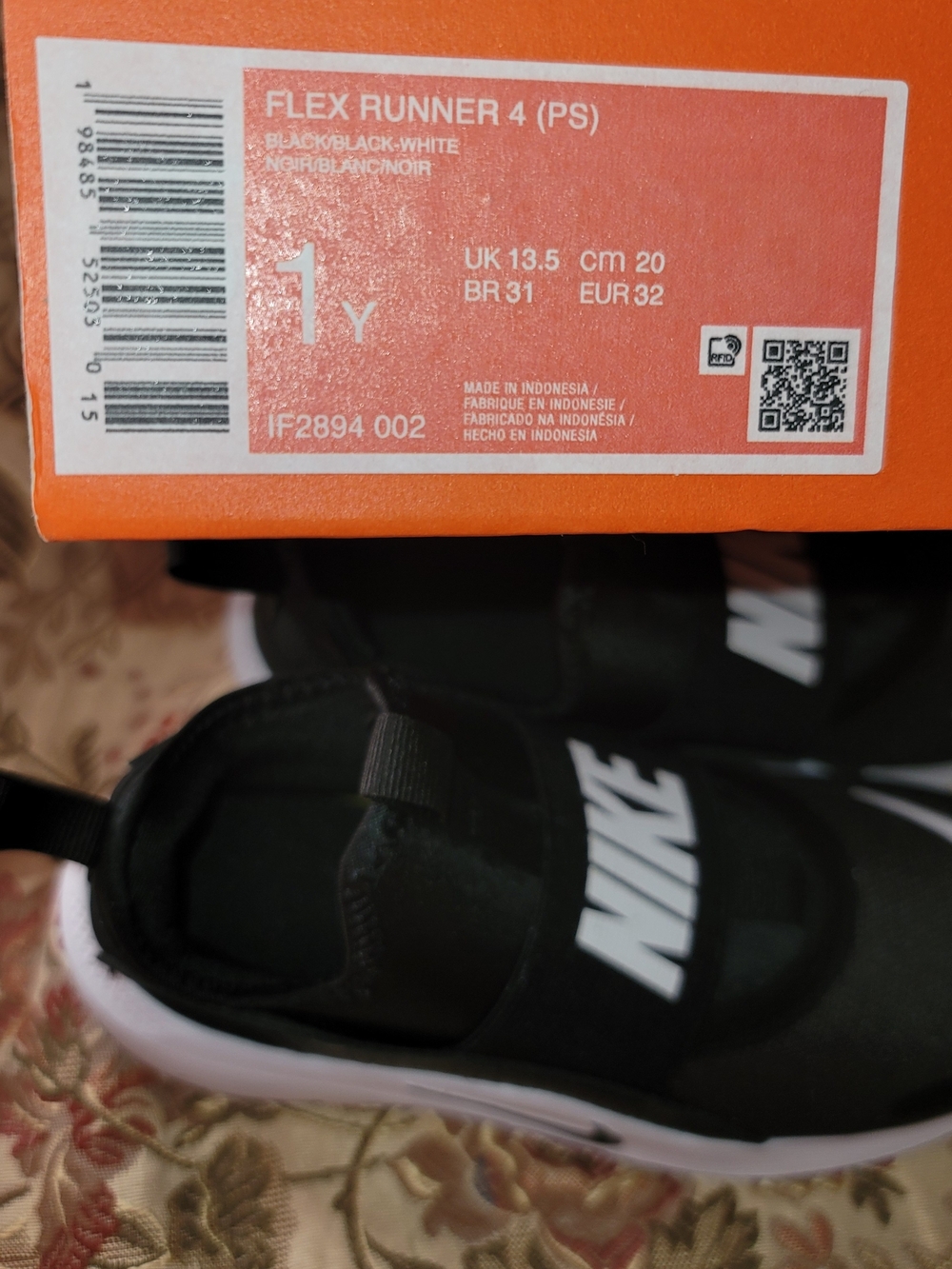 Nike Kids Slip-On Sneakers in Black and White